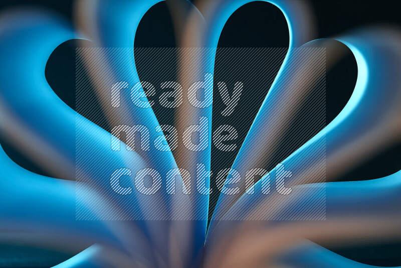 An abstract art piece displaying smooth curves in white and blue gradients created by colored light