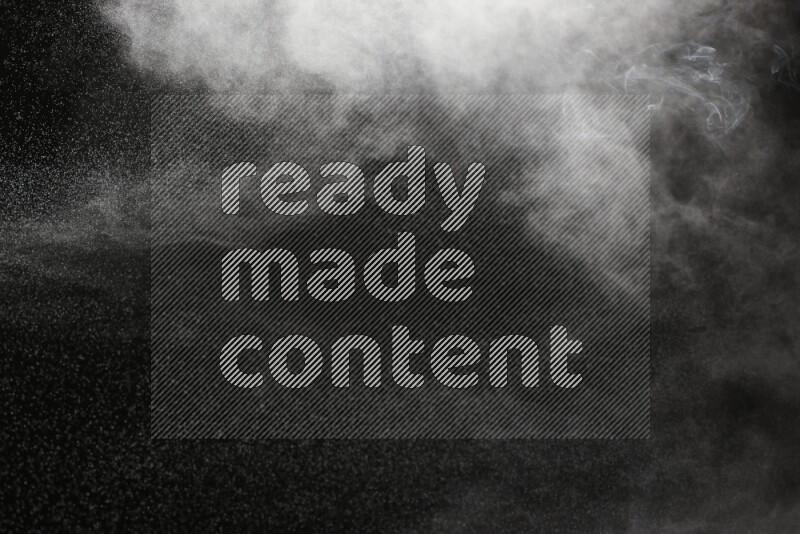 White powder explosion on black background