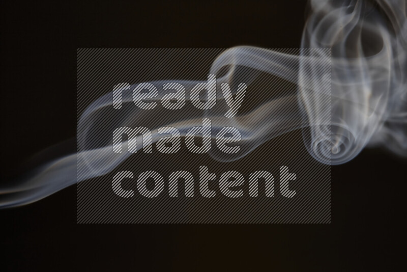 Motion of wavy smoke isolated on dark background