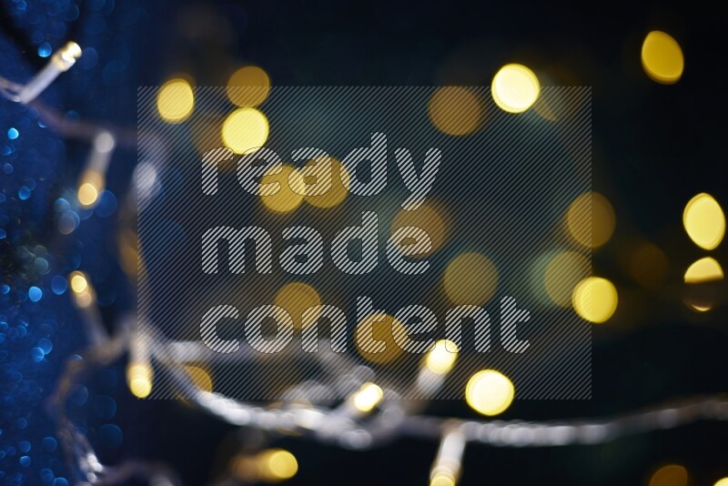 Bokeh light in yellow with blue background