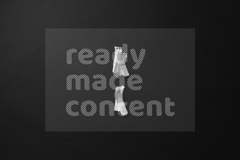 Ripped notebook sheet on black background