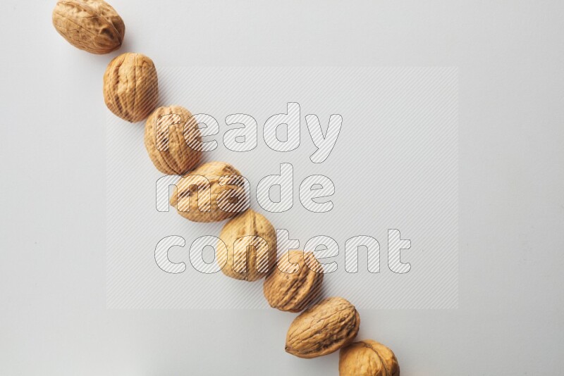Top-view shot of walnut on white background