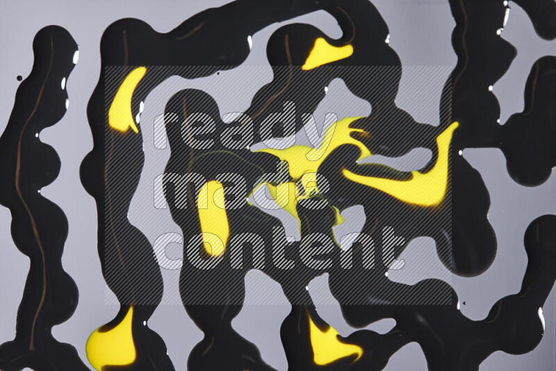 Abstract colorful background with mixed of yellow and black paint colors