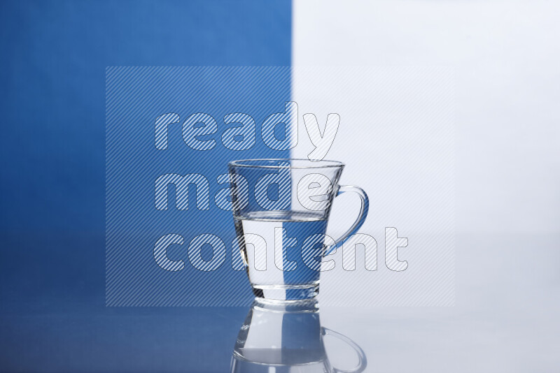 The image features a clear glassware filled with water, set against white and blue background