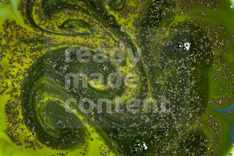 لقطة مقربة لبريق ذهبي متلألئ منتشر على خلفية من اللون الأخضر في حركات دائرية