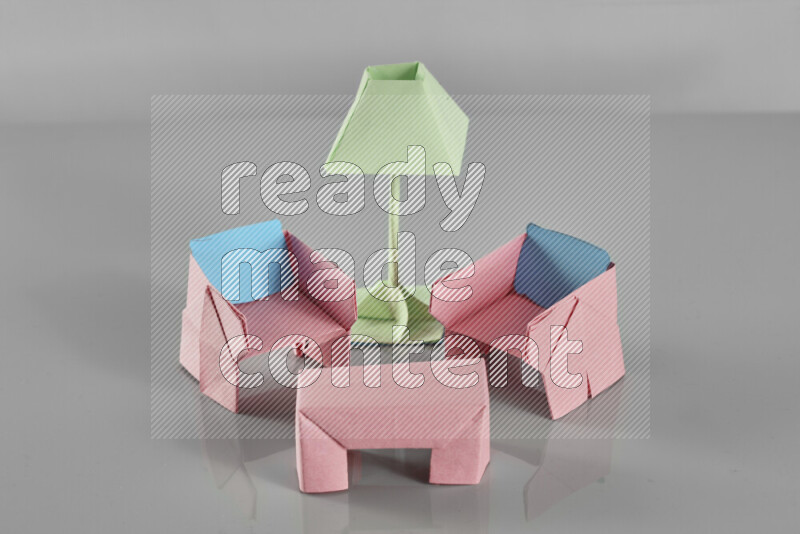 Origami living room on grey background