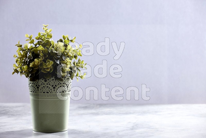 Artificial Plant in Light Green Decorative Pot on Light Grey Marble Flooring 15 degree angle
