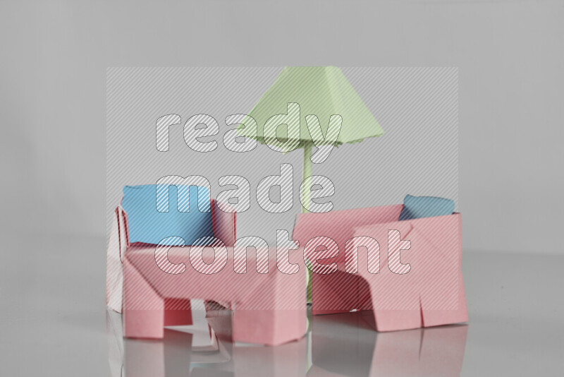 Origami living room on grey background