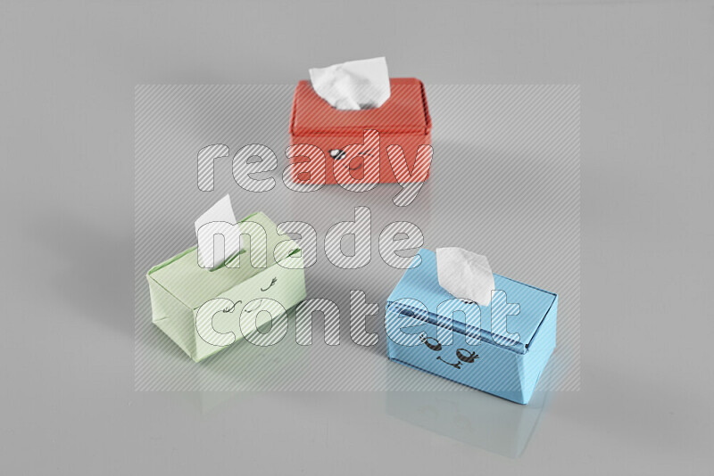 Origami tissue box on grey background