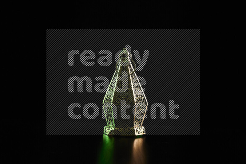 Ramadan lanterns with colored rim light against black background