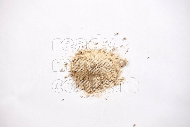 Garlic powder on a white flooring in different angles