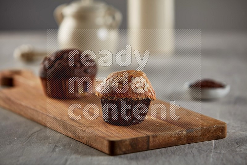 Peanut cupcake on a wooden board