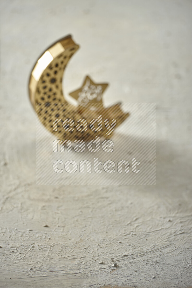 A lantern placed on a textured white background