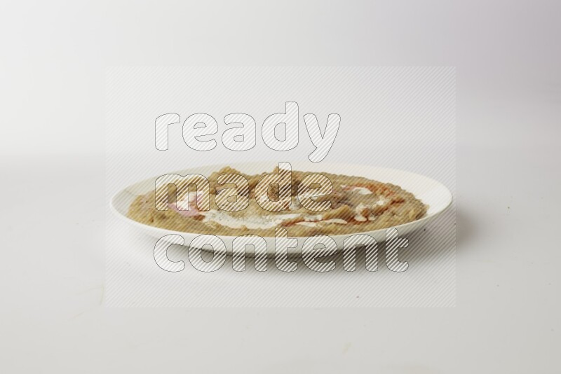 fava bean in a white plate direct on a white background