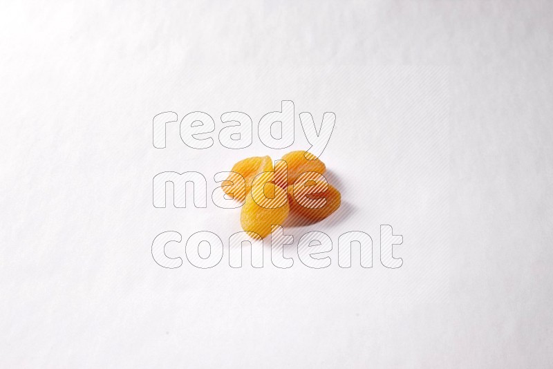 Dried apricots on white background