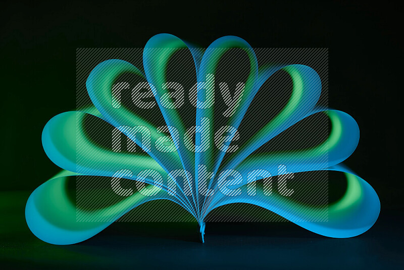 An abstract art piece displaying smooth curves in blue and green gradients created by colored light
