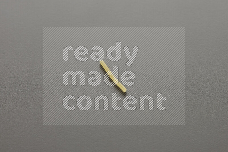 Vermicelli pasta on grey background