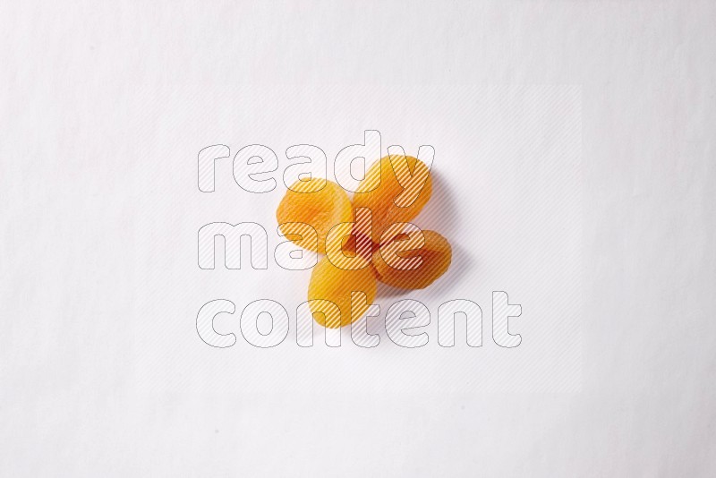 Dried apricots on white background