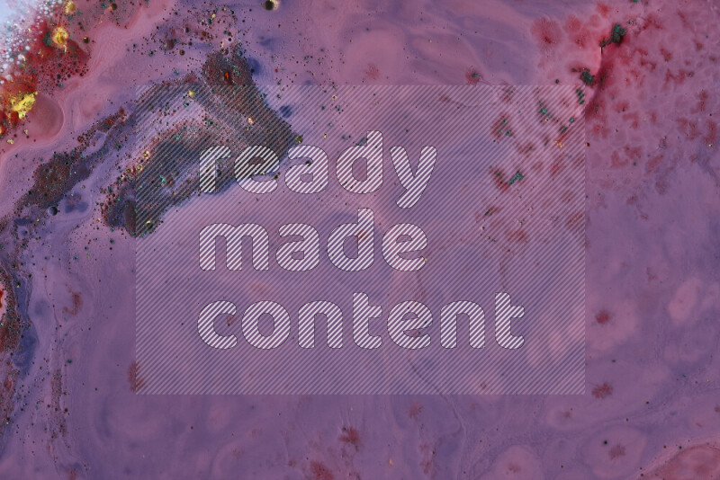 لقطة مقربة لأنماط دوامية باللون الأزرق والأحمر مع جزئيات ملونة