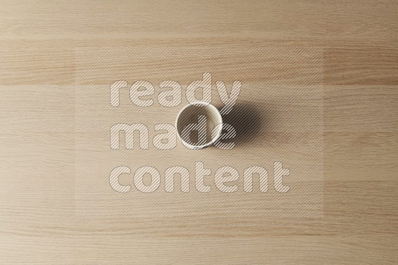 Top View Shot Of A Pottery Cup on Oak Wooden Flooring
