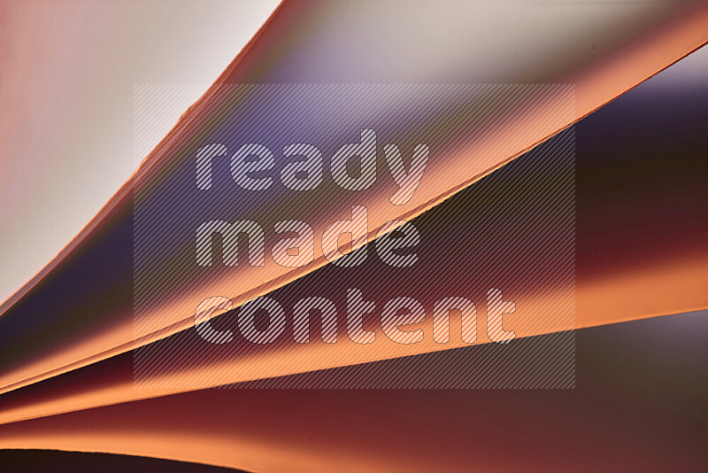 An abstract art piece displaying smooth curves in warm and cold gradients created by colored light