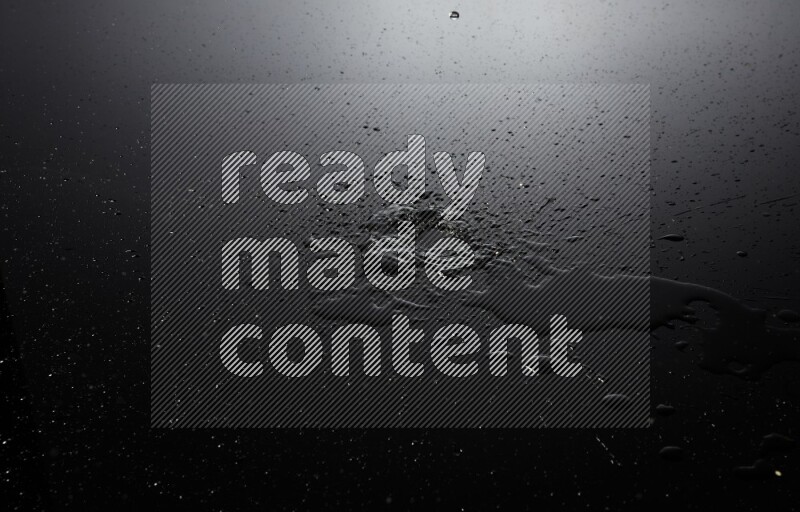 water drops, and droplets on black background