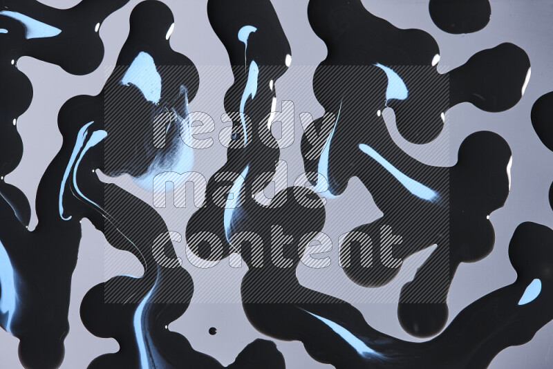 خلفية ملونة مع مزيج من ألوان الطلاء الأزرق والاسود