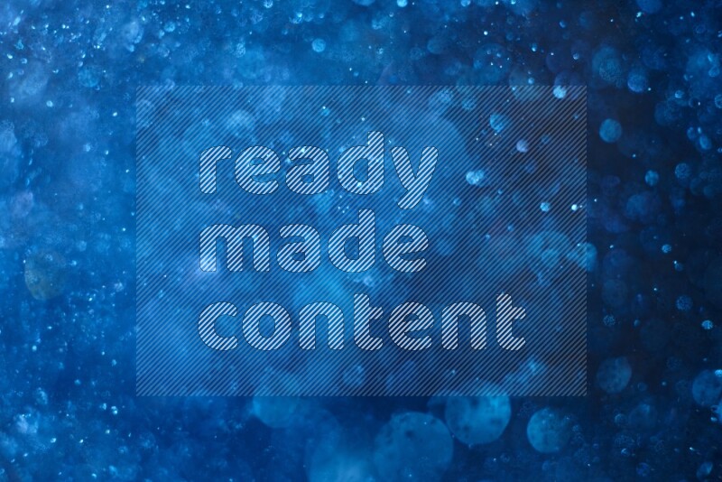 Blue glitter powder isolated on black background