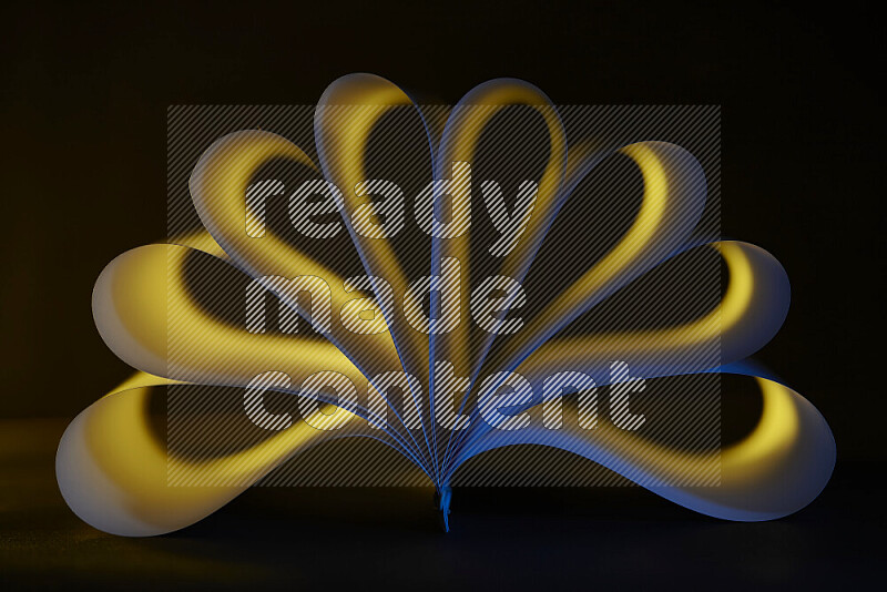 An abstract art piece displaying smooth curves in yellow and blue gradients created by colored light