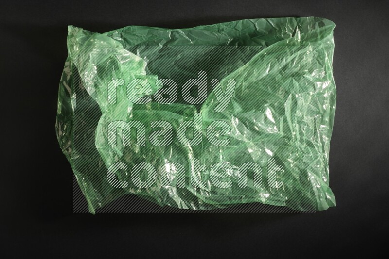 Colored plastic textures on black background