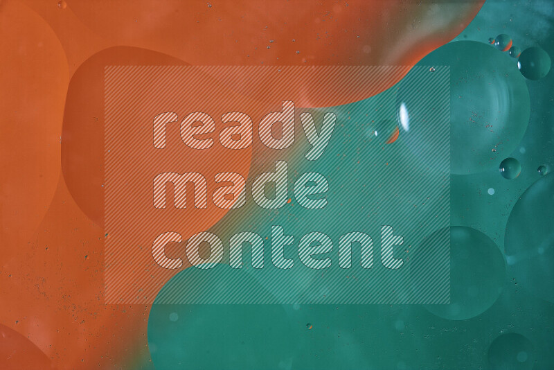 Close-ups of abstract oil bubbles on water surface in shades of green and orange