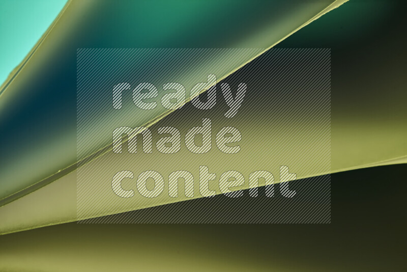 An abstract art piece displaying smooth curves in cold gradients created by colored light