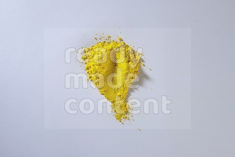 Yellow powder strokes on white background