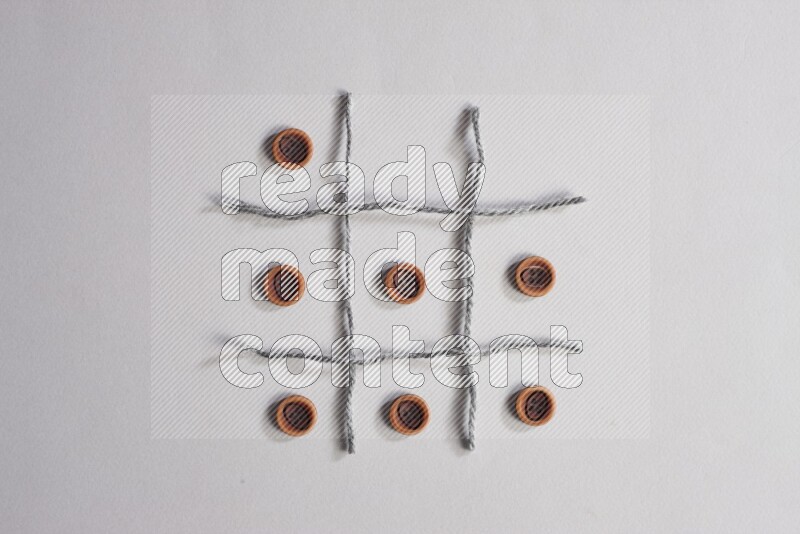 Wooden buttons placed on grey background