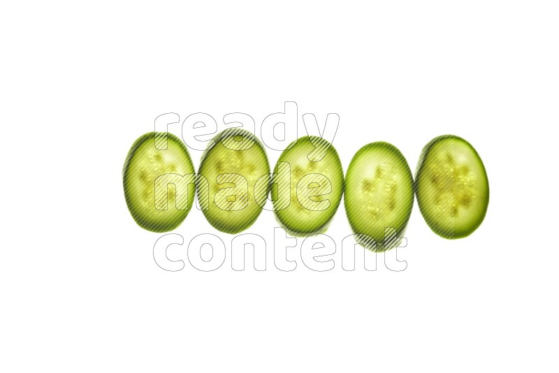 Zucchini slices on illuminated white background