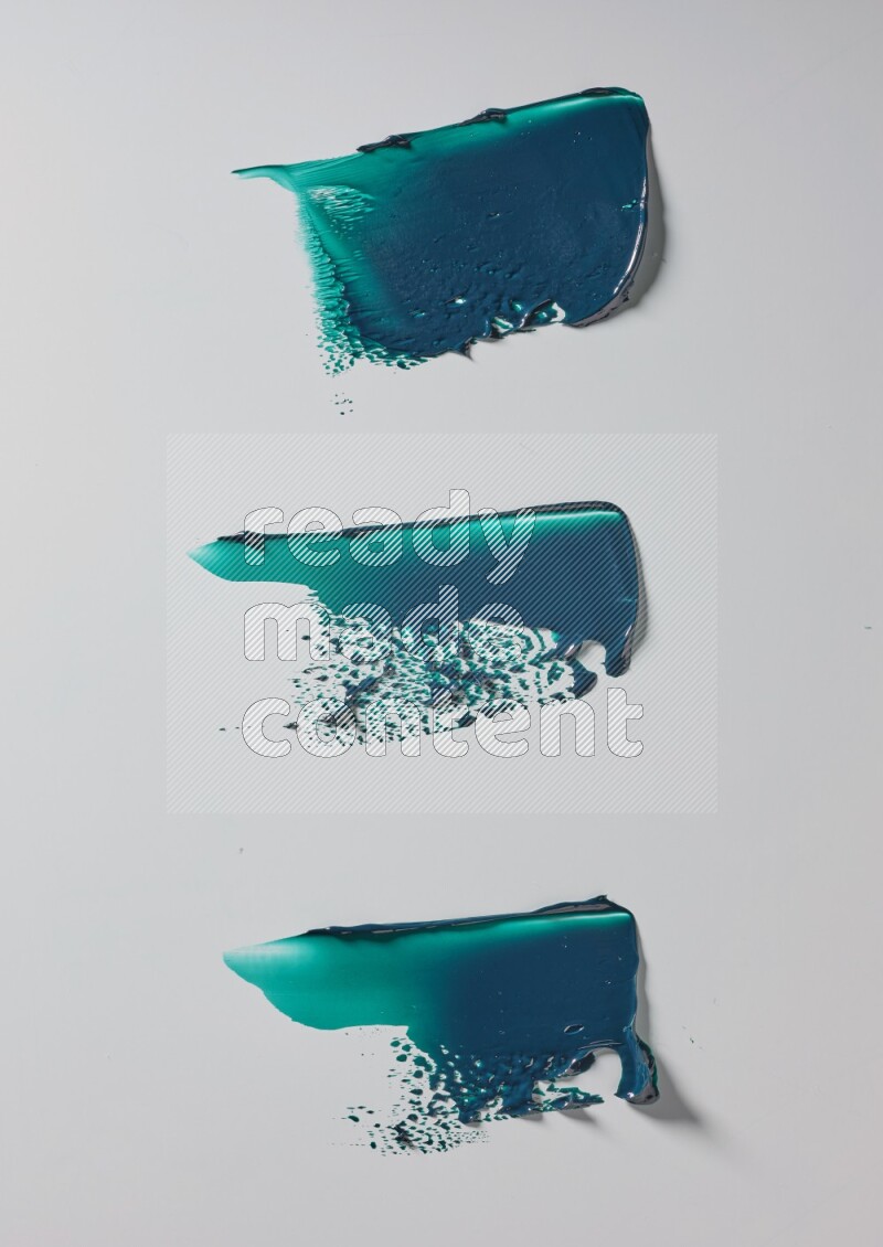 Turquoise painting knife strokes in on white background