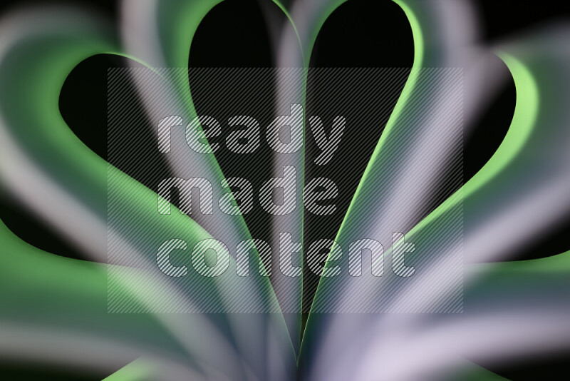An abstract art piece displaying smooth curves in green and white gradients created by colored light