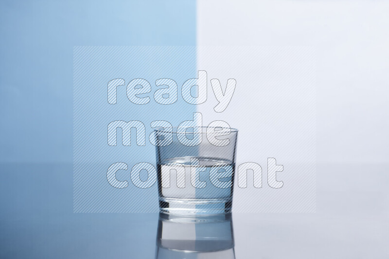 The image features a clear glassware filled with water, set against white and light blue background