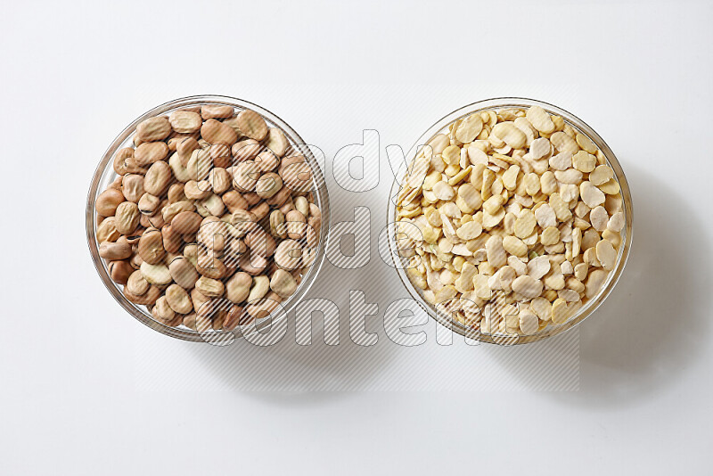 Fava beans with crushed beans on white background