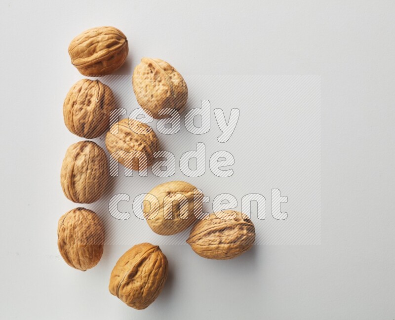 Top-view shot of walnut on white background