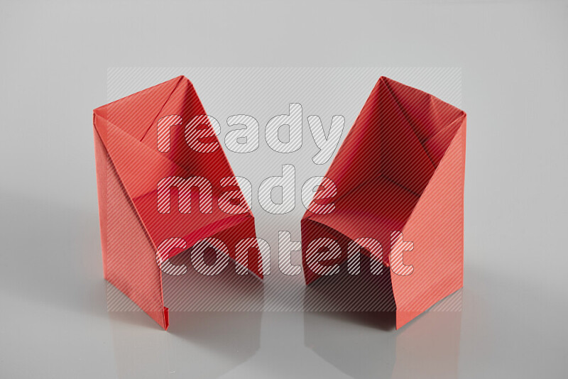 Origami dinning room on grey background