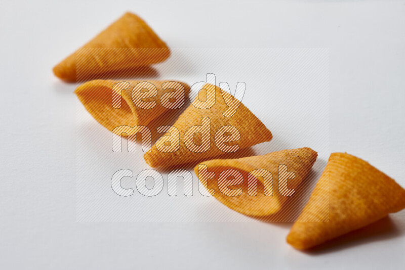 Assorted snacks on white background