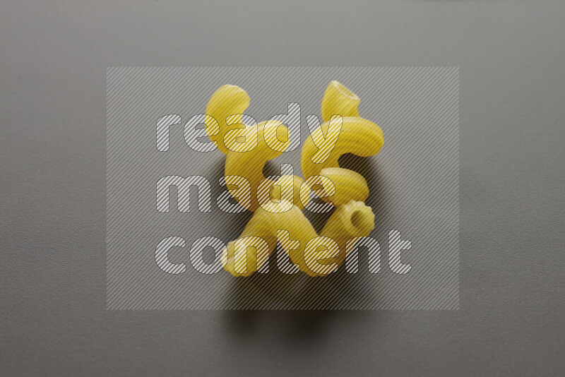 Twist pasta on grey background
