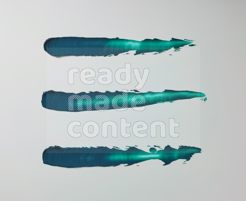 Turquoise painting knife strokes on white background