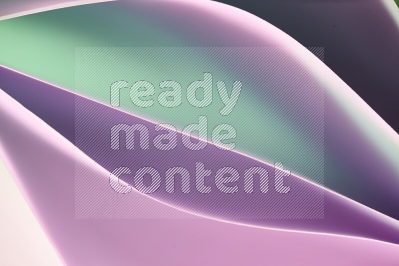 This image showcases an abstract paper art composition with paper curves in green and pink gradients created by colored light