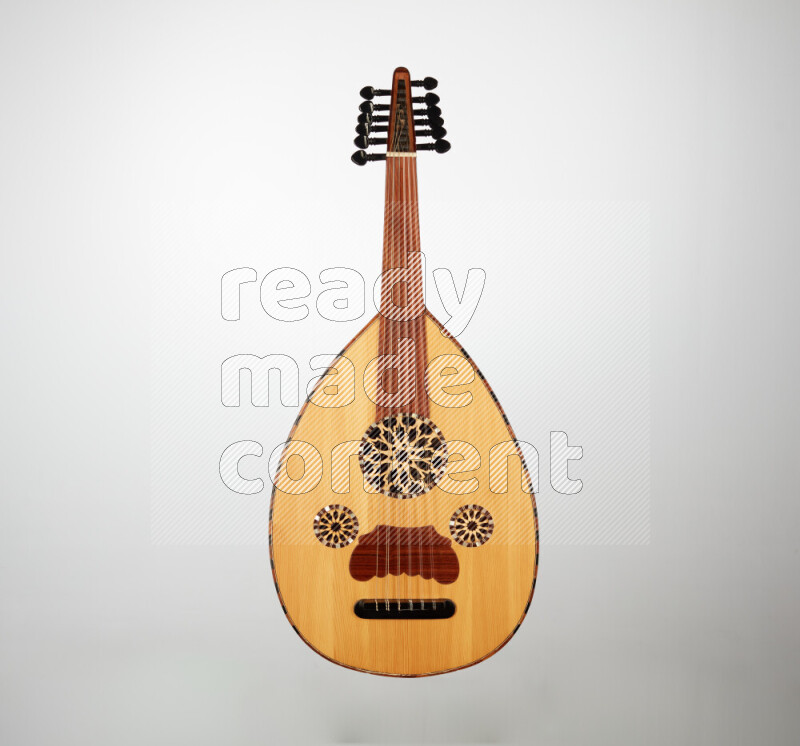 a wooden brown Oud on a gray background