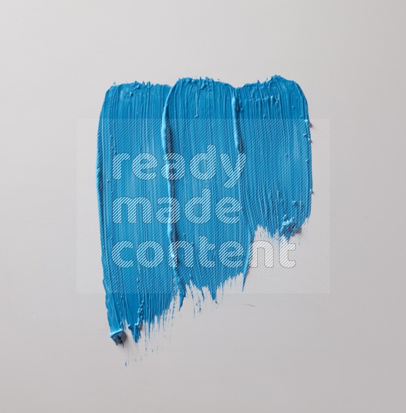 Multi blue straight brush strokes in different shapes on a white background