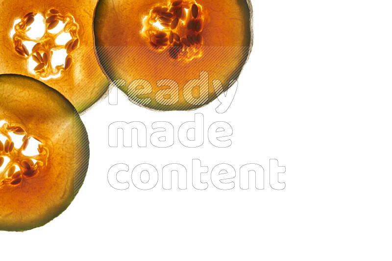 Cantaloupe slices on illuminated white background
