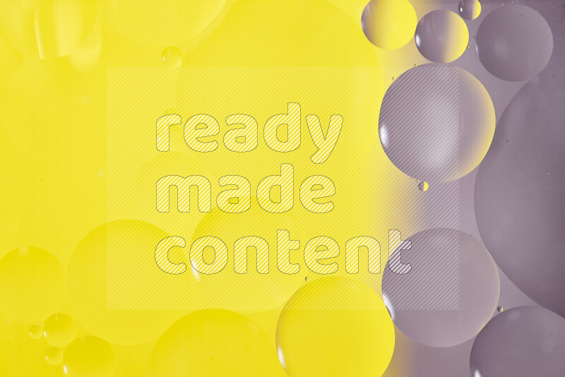 لقطات مقربة لفقاعات من الزيت على سطح الماء باللون الأبيض والأصفر