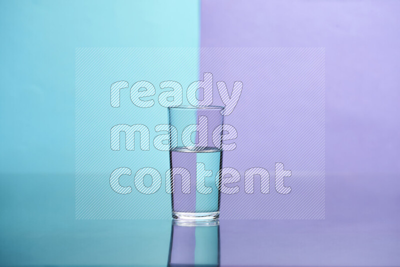 The image features a clear glassware filled with water, set against light blue and light purple background